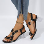 Damen modische Sandalen mit transparentem Riemen und Blumenapplikationen R&B