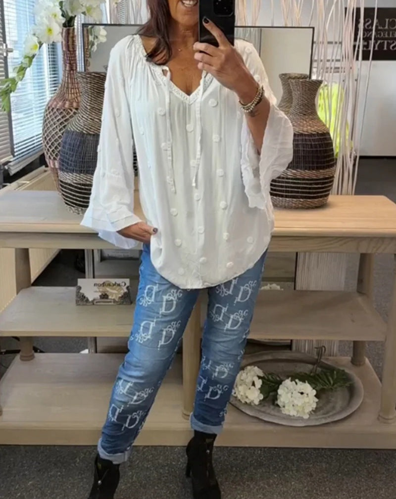 Damen Bluse mit voluminösen Ärmeln und dekorativen Knopfdetails Heidi-Mode