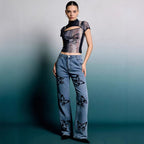 Damen Flared Jeans mit Blumendruck und hohem Bund