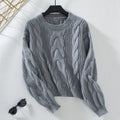 Damen grob gestrickter Pullover mit voluminösen Ärmeln und Zopfmuster