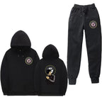 Damen Set aus Kapuzenpullover und Jogginghose mit einzigartigem Druck