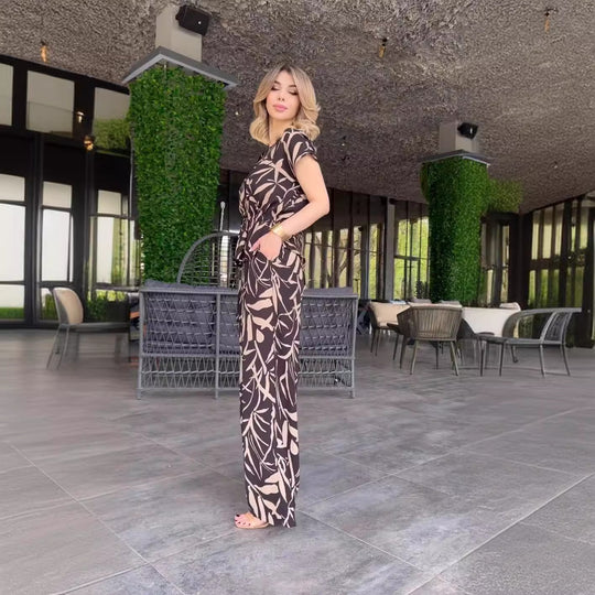 Damen Flowing Jumpsuit mit floralem Design und elastischer Taillierung R&B