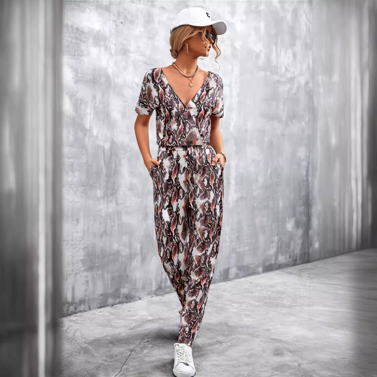 Damen elegante Jumpsuit im Snake-Print-Stil mit Taillengürtel und V-Ausschnitt R&B