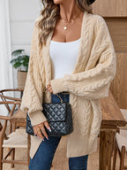 Damen Strickjacke mit kreativem Zopfmuster und lockerer Passform