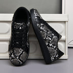 Damen Sportliche Sneakers mit elegantem Schlangenmuster
