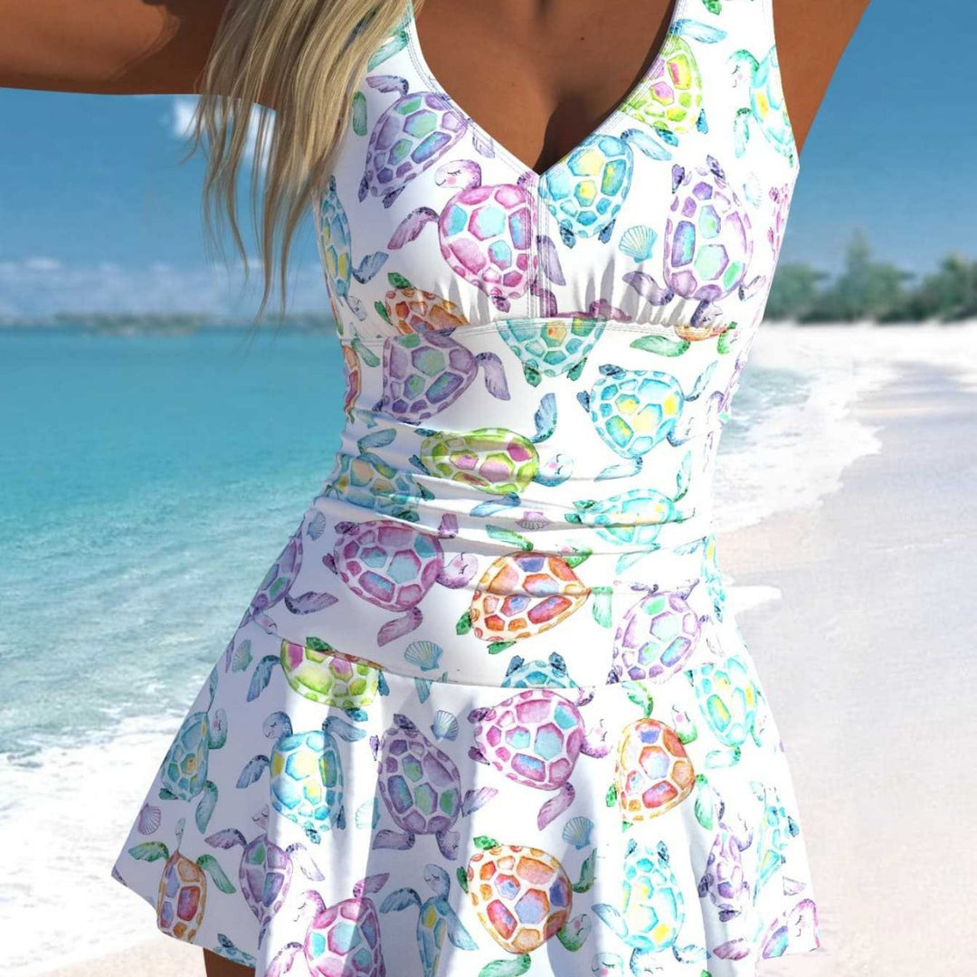 Damen Schwimmdress mit fröhlichem Schildkrötenmotiv und elegantem Rocksaum R&B