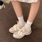 Damen modische Sneakers mit blühenden Applikationen und dämpfender Sohle R&B