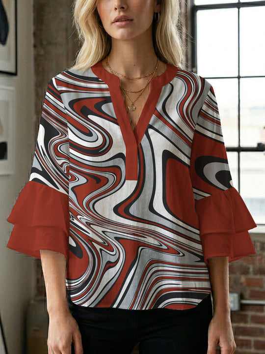 Damen Bluse mit voluminösen Flügelärmel und intensivem Blattmuster R&B