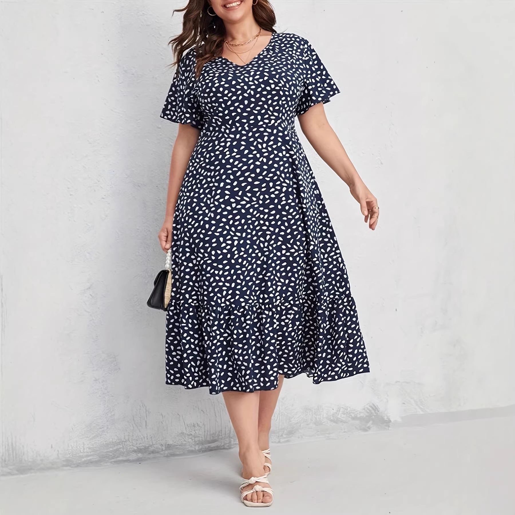 Damen Midi-Kleid mit fließendem Schnitt und verspieltem Muster R&B