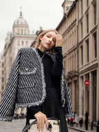 Damen luxuriöse Strickjacke mit fransigen Kanten und Knopfdetails