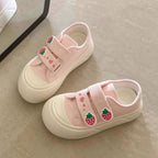 Damen Sneakers mit farbigen Knopf-Details und flexiblem Design