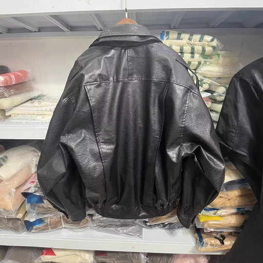 Damen modische Kunstlederjacke mit asymmetrischem Schnitt und dekorativem Gürtel R&B