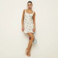 Damen Blumenmuster Minikleid mit Spaghettiträgern und schwingendem Rock R&B