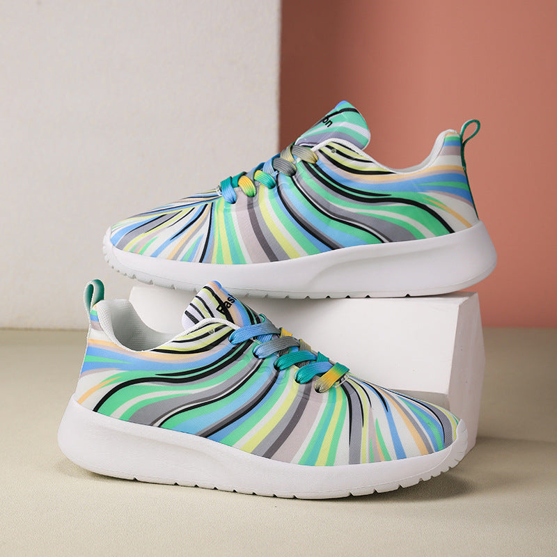 Damen Sportliche Sneakers mit buntem Wellenmuster