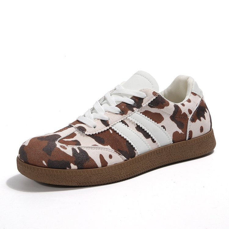 Damen Sportliche Sneakers mit trendigem Kuhdesign R&B