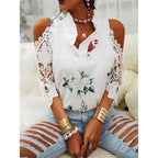 Damen Bluse mit Cut-Out-Ärmeln und floralem Design