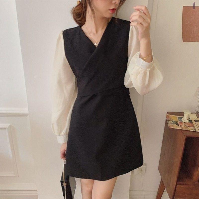 Damen Kleid mit stylischen Puffärmeln und eleganter Taillierung