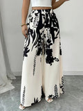 Damen weite Palazzo-Hose mit floralem Muster