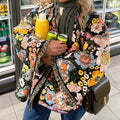 Damen Steppjacke mit floralem Design und weiten Ärmeln