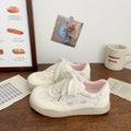 Damen Sneaker mit floralen Applikationen