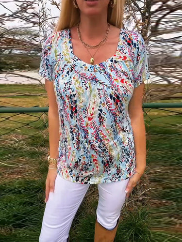 Damen Kurzarmbluse mit floralem Muster und raffiniertem Schnitt Heidi-Mode