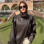 Damen nan oversized Bikerjacke Kunstlederoptik mit hohem Stehkragen, asymmetrischer Druckknopffront, Schulterriegeln und elastischem Saum R&B