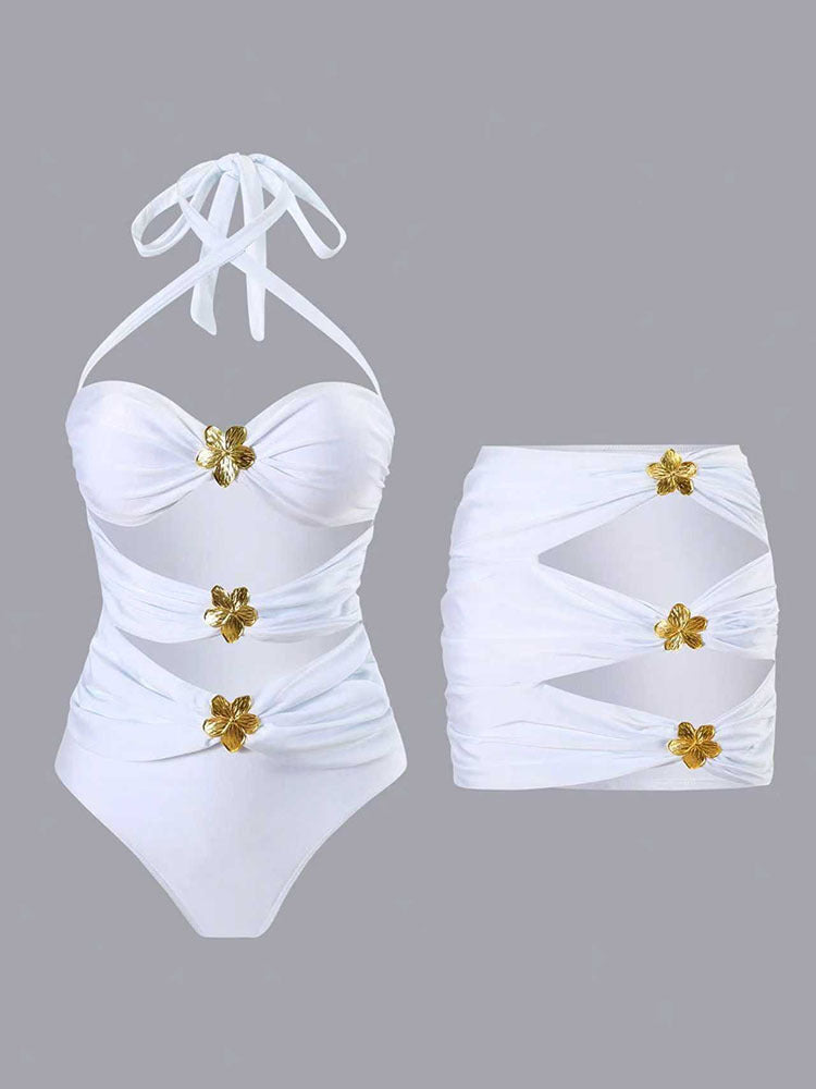 Damen Einteiler Badeanzug mit eleganten Drapierungen und Goldakzenten