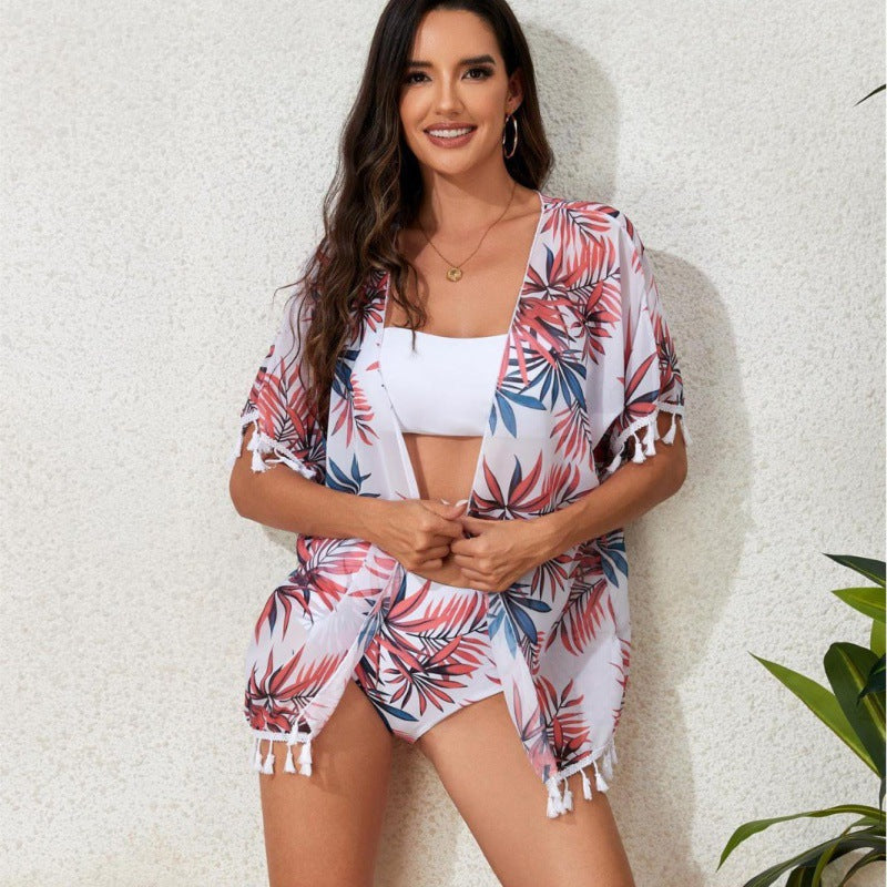 Damen Strandkleid mit floralem Design und fransenverziertem Überwurf R&B