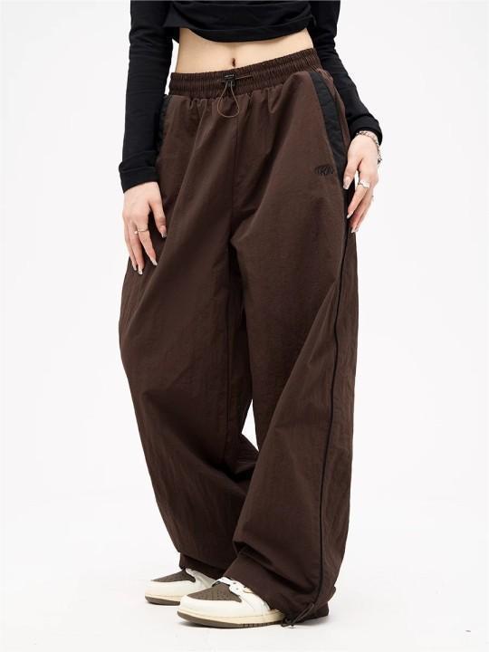 Damen weite Freizeithose mit elastischem Bund und seitlichen Reißverschlüssen