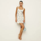 Damen Blumenmuster Minikleid mit Spaghettiträgern und schwingendem Rock R&B