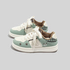 Damen Sportliche Sneakers mit verspieltem Tiermotiv und samtigen Akzenten