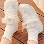 Damen Sportliche Sneaker mit atmungsaktivem Mesh-Obermaterial und dekorativen Schleifen