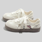 Damen Sportliche Sneaker mit verspieltem Design und einzigartigen Applikationen