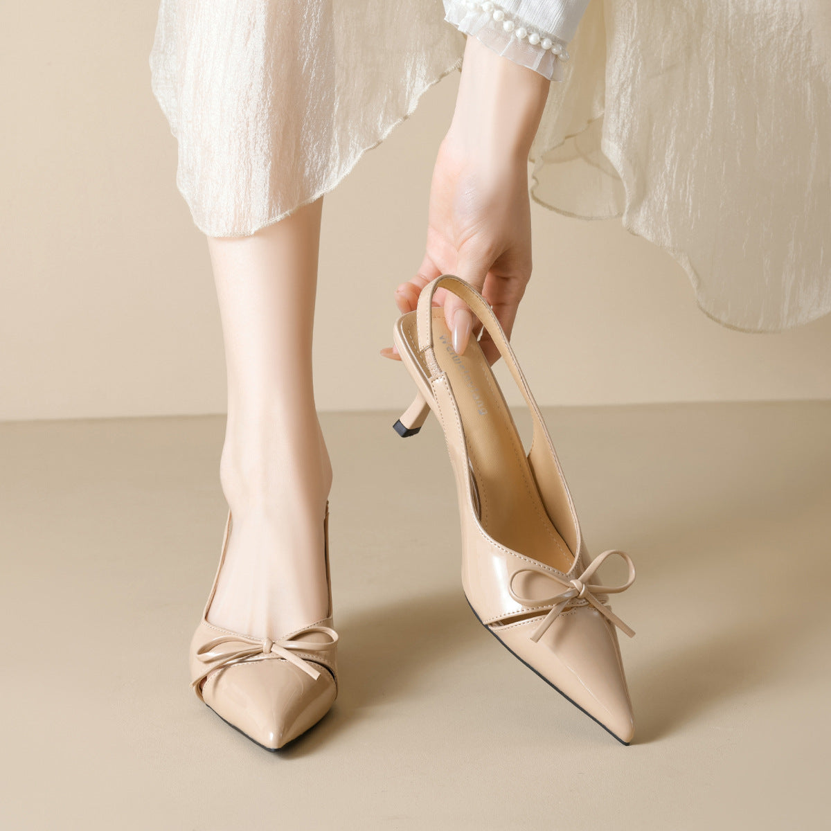 Damen Slingback-Pumps mit modischem Schleifendesign und elegantem Lackfinish