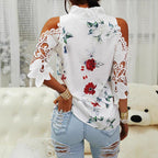 Damen Bluse mit Cut-Out-Ärmeln und floralem Design
