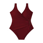 Damen Einteiler Badeanzug mit elegantem Wickeldesign und raffinierten Ziernieten