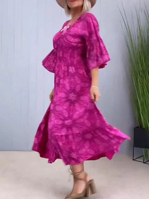 Damen Maxikleid mit elegantem V-Ausschnitt und schwingendem Rock Heidi-Mode