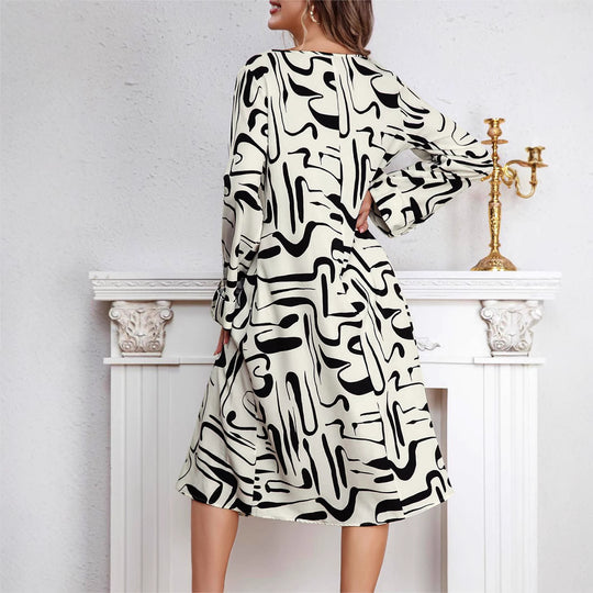 Damen Midikleid mit modernem Grafikdruck und V-Ausschnitt R&B