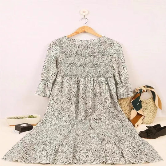 Damen Kleid mit floralen Akzenten und luftigen Puffärmeln Heidi-Mode