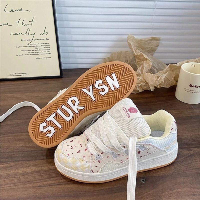 Damen Sneaker mit floralem Design und extra dicker Sohle