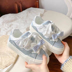 Damen Verspielte Sneakers mit dekorativem Schleifen-Design Heidi Mode
