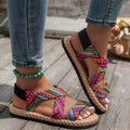 Damen nan flache Espadrille-Riemchensandalen mit geflochtenem Bastrand, elastischem Fersenband und gekreuzten Ethno-Riemen R&B