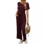 Damen Jumpsuit mit Bindegürtel und weitem Bein