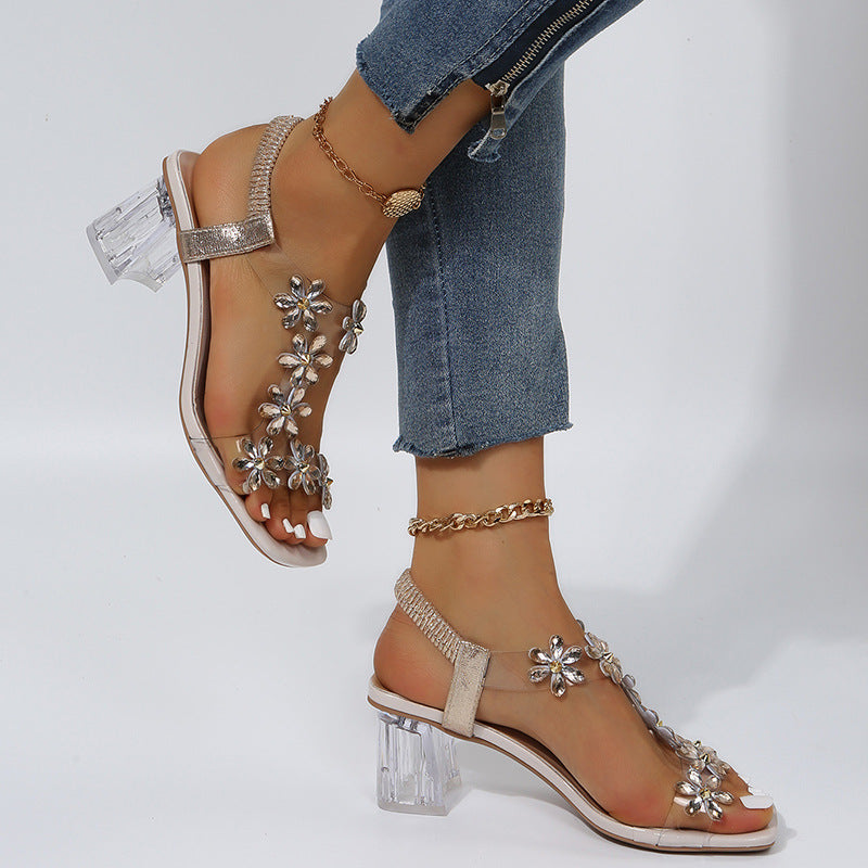 Damen modische Sandalen mit transparentem Riemen und Blumenapplikationen R&B