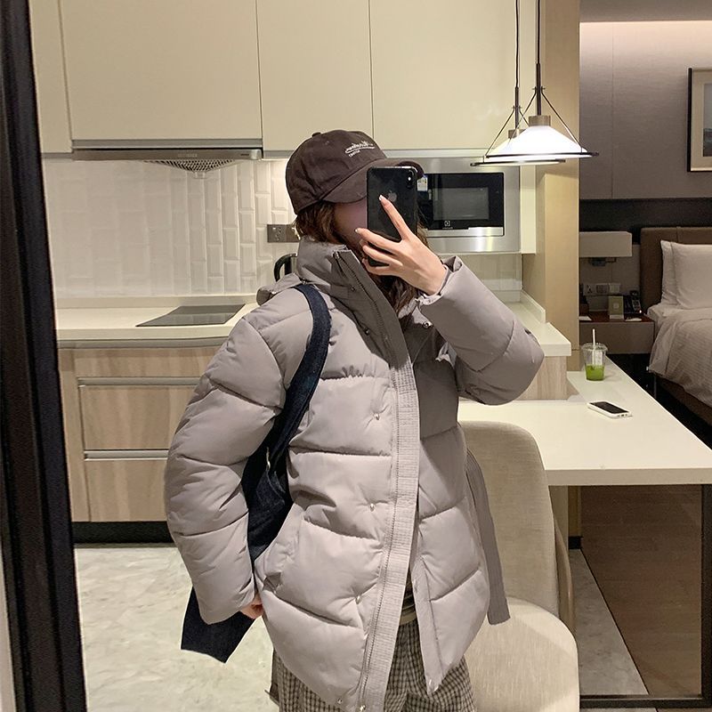 Damen gesteppte Winterjacke mit hohem Kragen und seitlichen Taschen