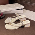 Damen elegante Flip-Flops mit glitzerndem Riemen und floralem Detail EB
