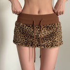 Damen eleganter Minirock aus fellartigem Material mit Modellknopf und Taillenband R&B