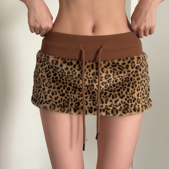 Damen eleganter Minirock aus fellartigem Material mit Modellknopf und Taillenband R&B