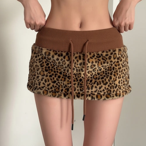 Damen eleganter Minirock aus fellartigem Material mit Modellknopf und Taillenband R&B