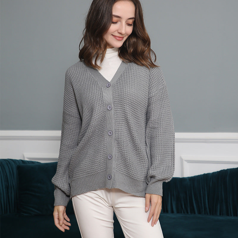 Damen Strickjacke mit strukturiertem Muster und praktischen Knopfdetails